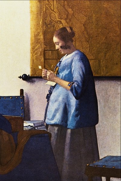 Vrouw die een brief leest door Jan Vermeer van Delft